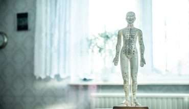 back pain acupuncture doll